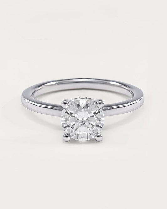 Round cut engagement ring with hidden halo