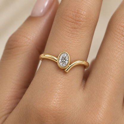 Oval Bezel Wave Diamond Ring in Gold illustrative worn view with indicative color and proportions