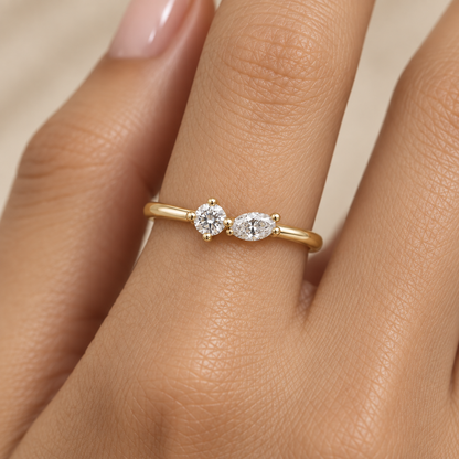 Round and Marquise Diamond Ring in Gold illustrative worn view with indicative color and proportions