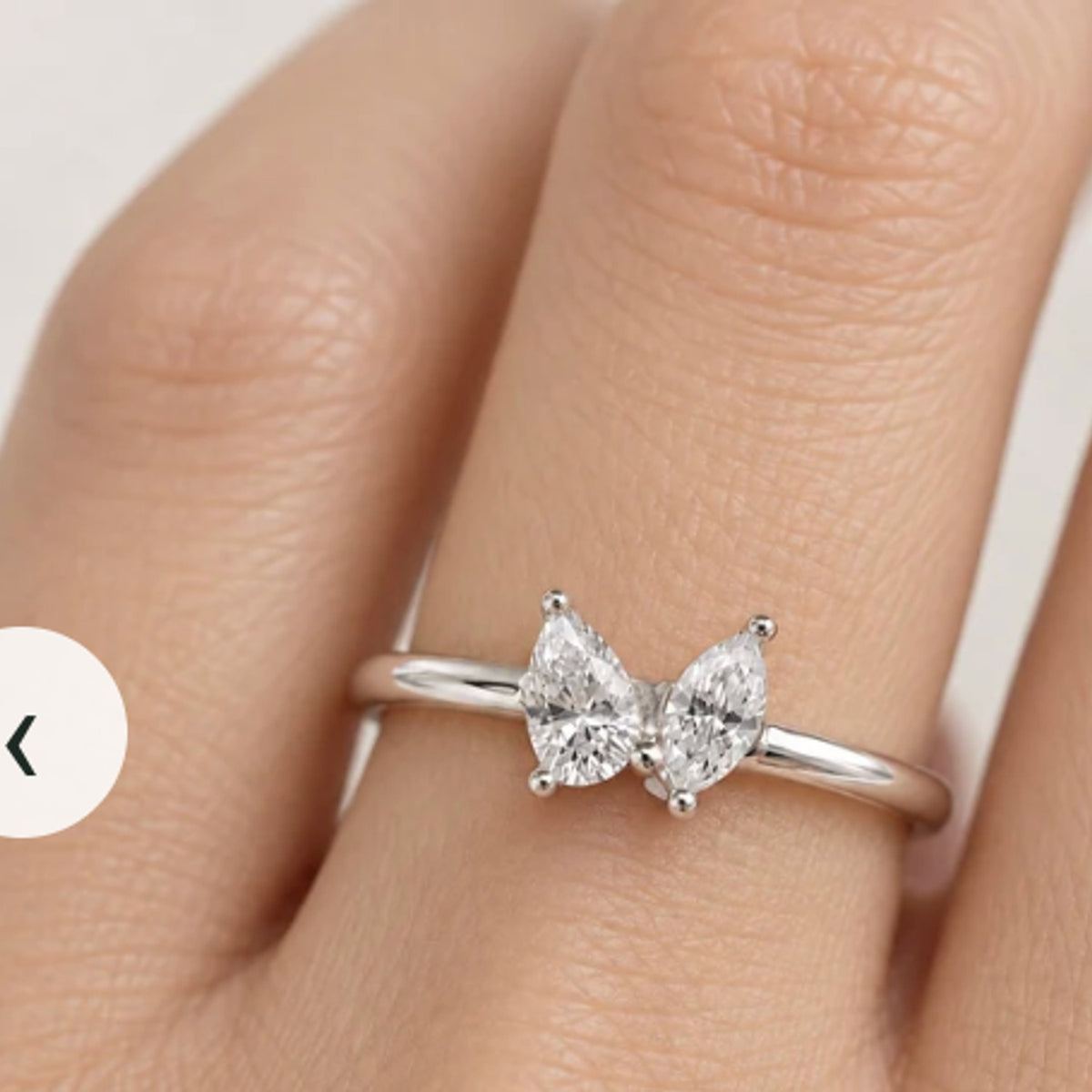 Double Pear Diamond Ring in Gold illustrative worn view with indicative color and proportions