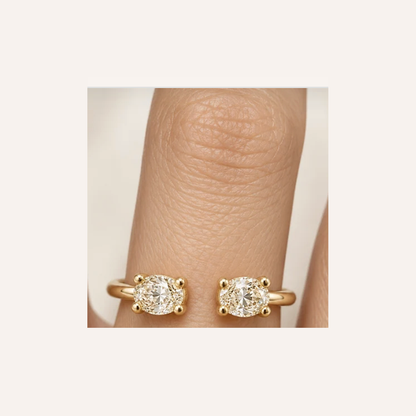 Open Oval Diamond Ring in Gold close-up worn on finger, indicative color and proportions
