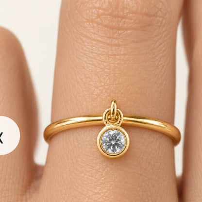Round Bezel Diamond Charm Ring in Gold illustrative worn view with indicative color and proportions