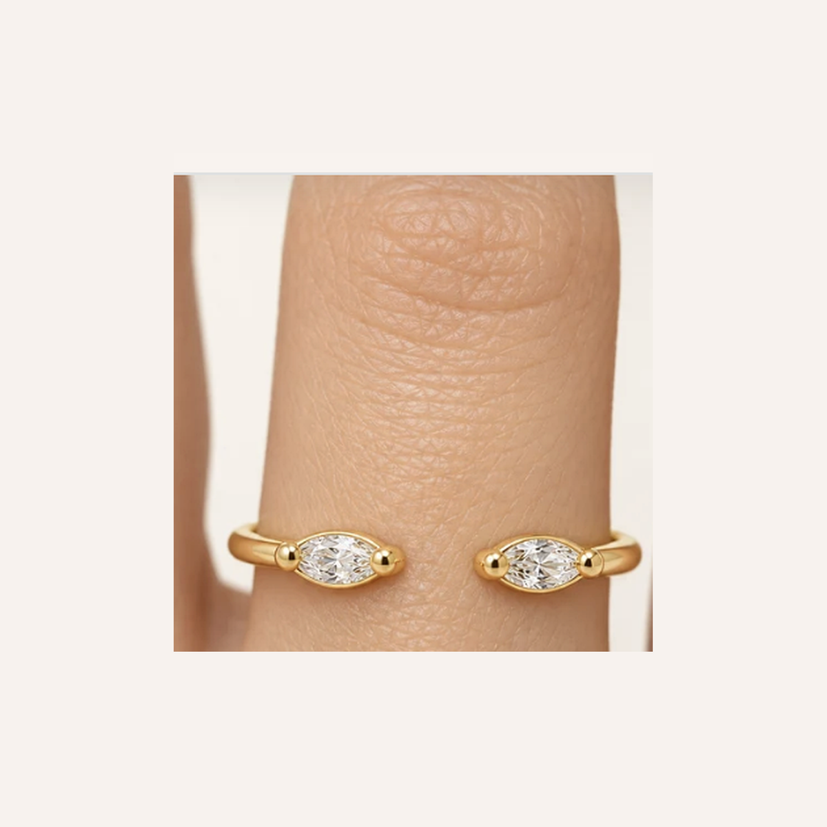 Open Marquise Diamond Ring in Gold close-up worn on finger, indicative color and proportions