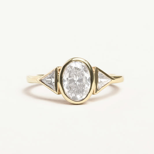 Oval & Trillion Cut Diamond Three Stone Bezel Ring