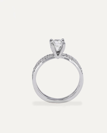 Round cut diamond engagement ring with split pavé bands
