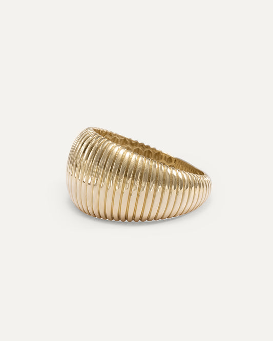 Wide gold ring with lined pattern