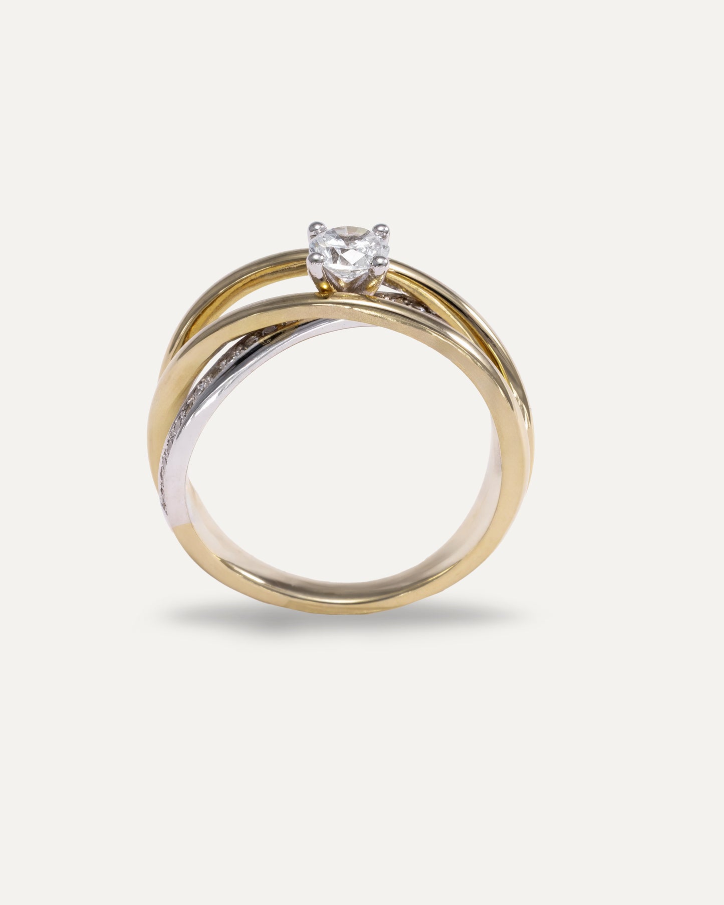 Intertwined engagement ring with diamonds