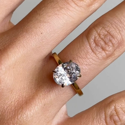 Oval Cut Diamond Ring With Hidden Halo