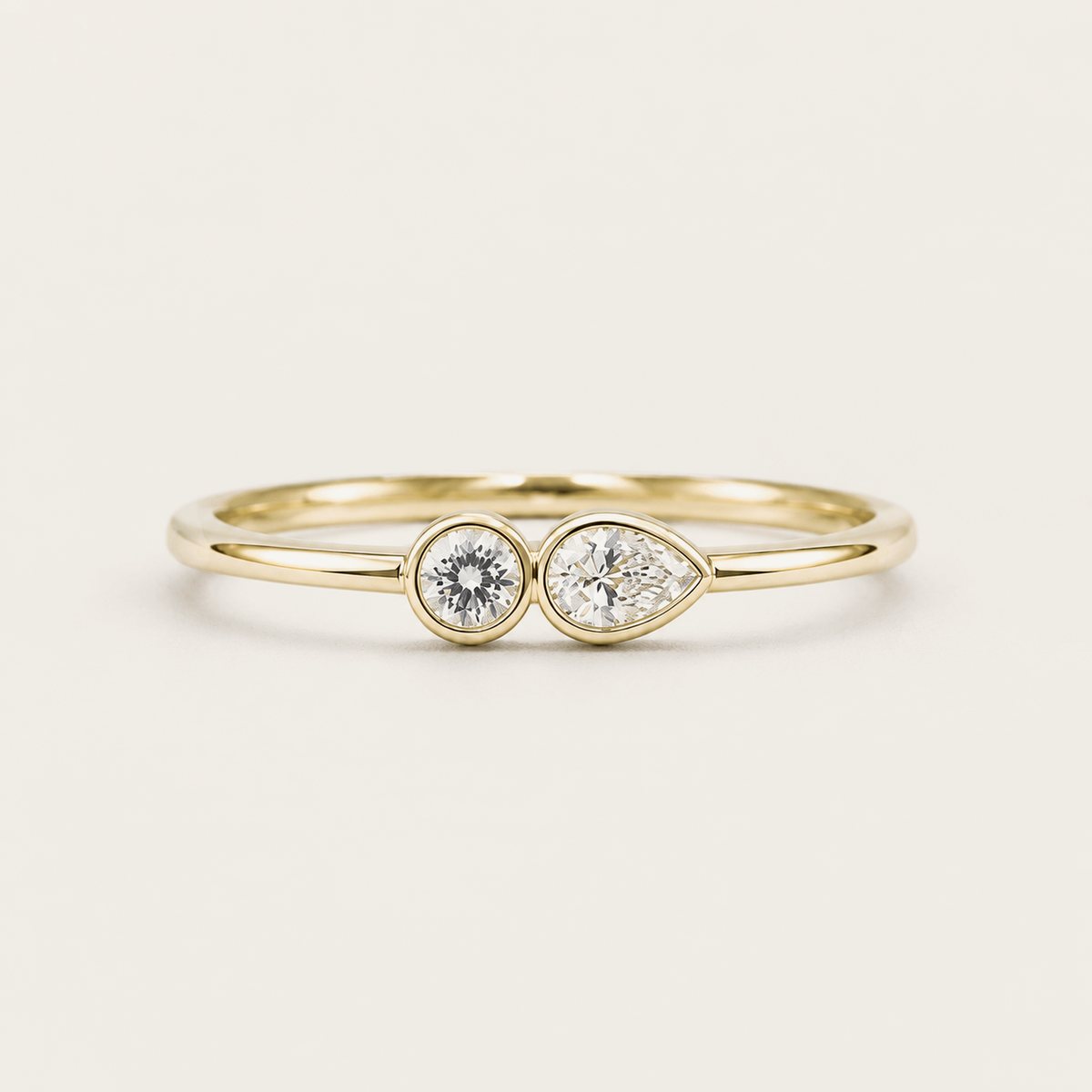 R4438 Round and Pear Bezel Diamond Ring in Gold product photo