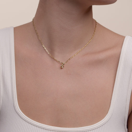 The Hear Charm Necklace. 14K solid recycled gold.