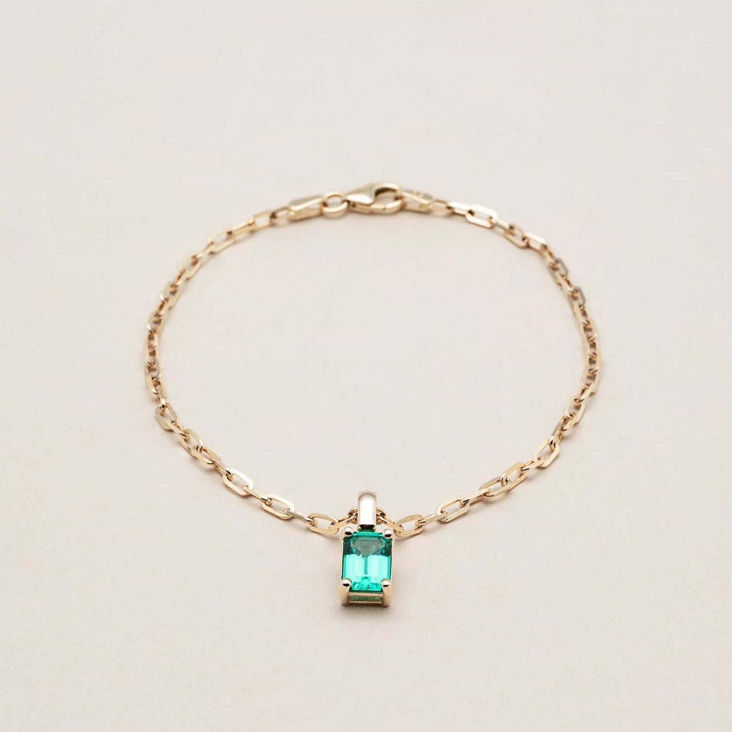 Emerald charm bracelet discount