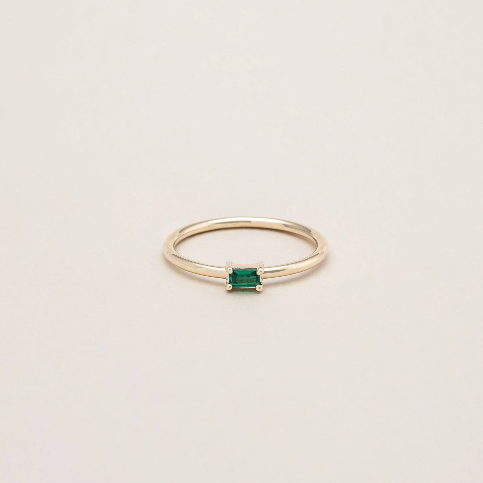The Emerald Mini Baguette Ring. Recycled solid 14K gold.