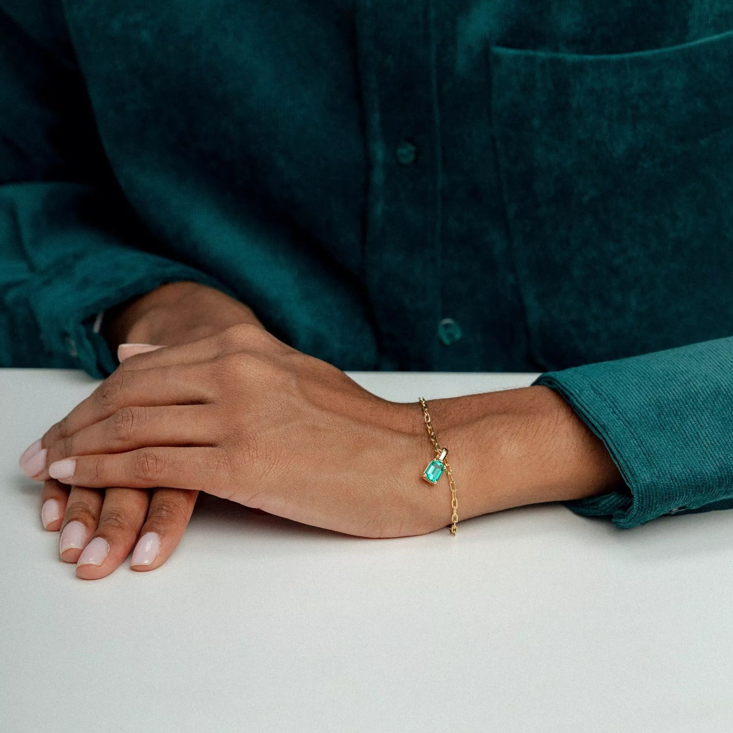 The Green Emerald Charm Bracelet on Model. Recycled Solid 14K Gold 