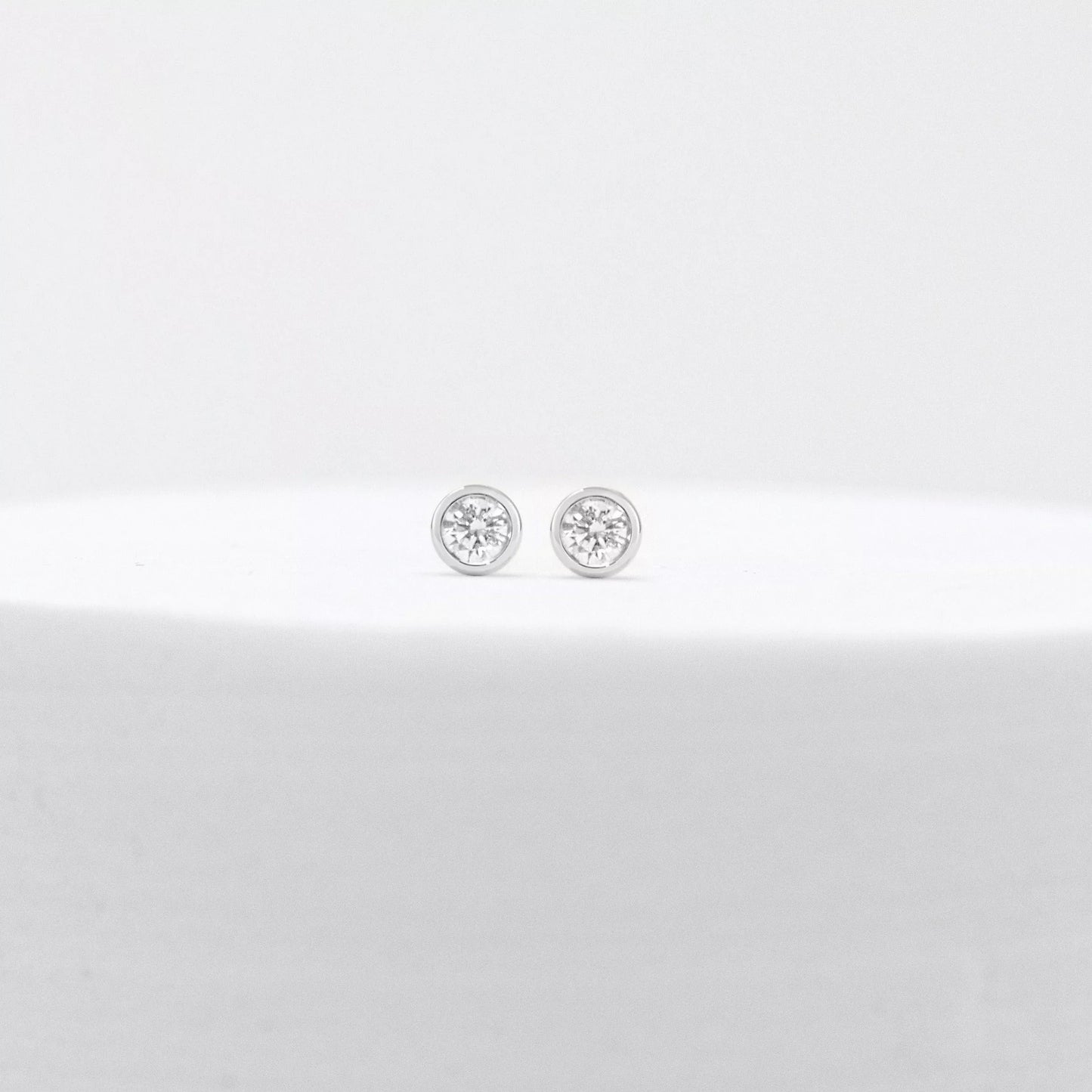 The Solitaire Bezel Studs Earrings. Recycle Gold
