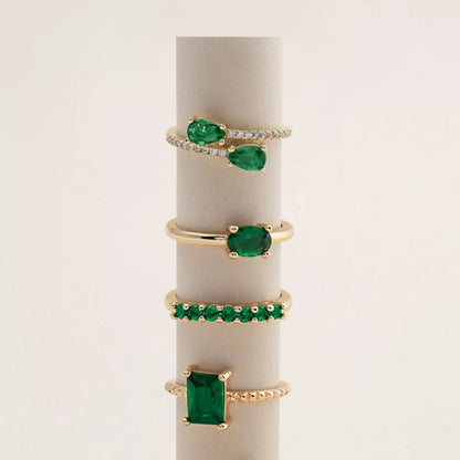 Mixed emerald rings collection