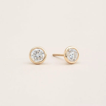 The Solitaire Bezel Studs Earrings. Recycle Gold