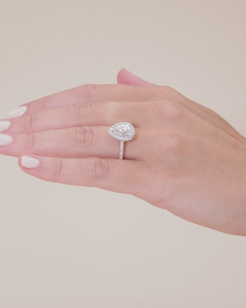 Pear shaped store pave engagement rings